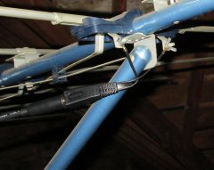Our old blue antenna, connected to the brand-new balun and coaxial cable